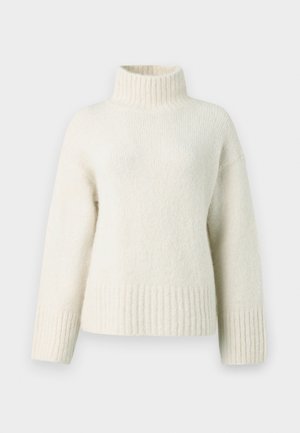Cremefarvet strikket sweater med høj krave, dropped shoulders og ribbede manchetter og kant. Blødt, struktureret stof tilfører varme.