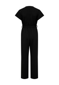 Juodas kombinezonas su trumpomis rankovėmis, elastinga liemens juosta, plačiomis kojų juostomis ir šoninėmis įpjovomis apačioje, suteikiančiomis daugiau judėjimo laisvės. Lygi tekstūra.