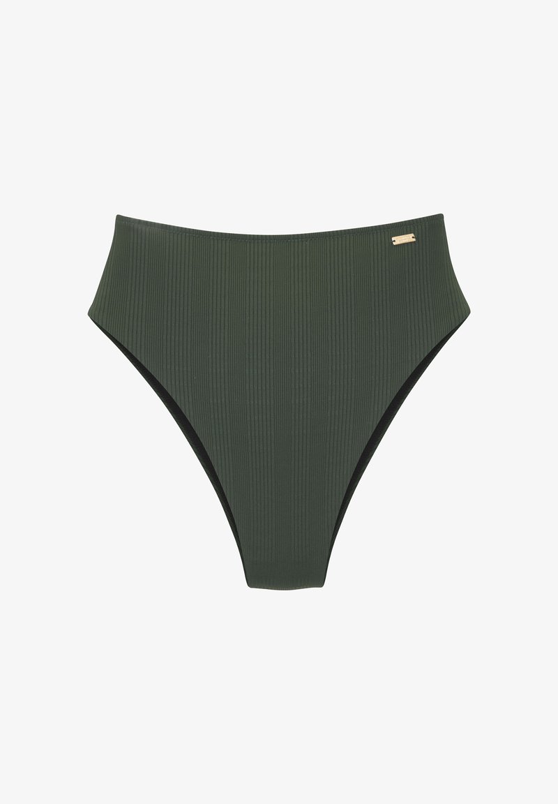 Model visokega pasu v temno zeleni rebrasti tkanini, ki ima brezšivno zasnovo in majhen kovinski detajl na strani.