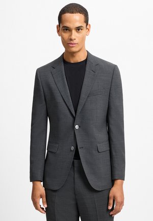 Gray tailored suit jacket with a subtle checked pattern, notch lapels, two front pockets, and a single button closure. Textured fabric.