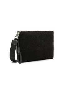 Borsa a tracolla nera realizzata in un tessuto testurizzato con chiusura a zip. Presenta un polsino in tessuto staccabile e un accento in pelle liscia.