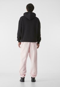 9N1M SENSE ESSENTIAL - Träningsbyxor - pink