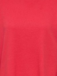 Tissu tricoté rouge, légèrement texturé avec une finition lisse, présentant une couleur unie sans motifs visibles ni détails matériels.