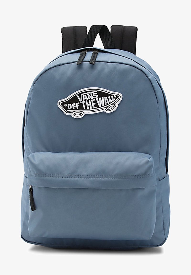 Sac à dos bleu Vans avec une poche avant zippée et un écusson noir du logo "Off The Wall" en forme de skateboard.