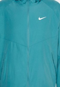 Nike Performance Windbreakers - mint