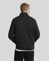 Zwarte, lichte sweatshirt met een hoge kraag en ribgebreide manchetten. Zachte textuur, minimalistisch ontwerp, voorzien van een achternaad en een casual pasvorm.