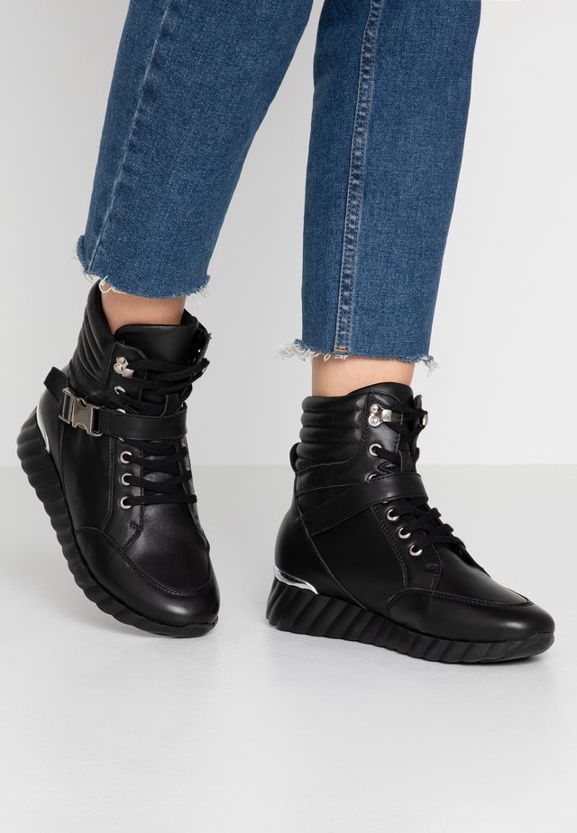 Lace-up ankle boots - nero