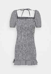 Robe vichy noir et blanc avec manches courtes ballon, corsage smocké, encolure carrée, et détail de ourlet à volants. Texture unie sur toute la surface.