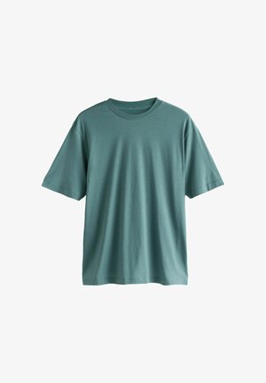 Lühikese varrukaga t-särk tuhmides teal-toonides, valmistatud pehmest puuvillast, ümmarguse kaeluse ja lõdva istuvusega. Ilma nähtavate logode või mustriteta.