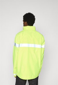 Vaude MENS LUMINUM RAIN JACKET - Sykkeljakke - neon yellow