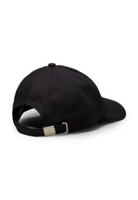Black baseball cap featuring a curved visor, textured fabric, and an adjustable strap with a metal buckle at the back.