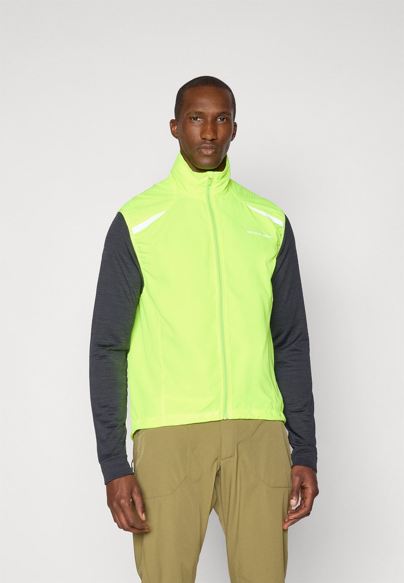 Men's vest in bright neon green with gray long sleeves, full zip front, reflective accents, and a fitted design. Made from lightweight material.