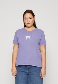 Lavender cotton T-shirt featuring a round neck and short sleeves, with a white graphic print reading "MYSTIC" at the center.