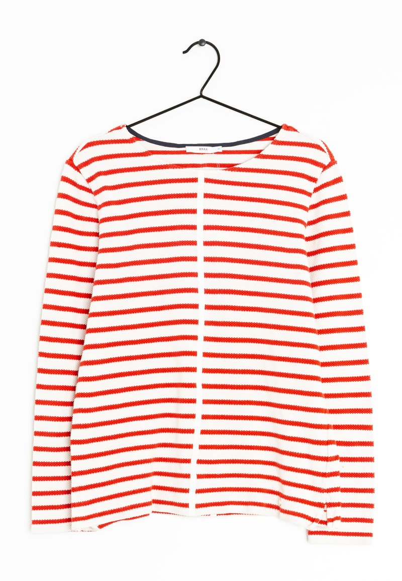Maglione a righe rosse e bianche con maniche lunghe, scollatura rotonda e orlo dritto. Presenta una cucitura verticale centrale e un'asola per appendere.