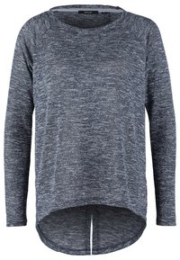 Haut à manches longues bleu marine avec un motif texturé, un col rond et une longueur de dos plus longue. Fabriqué en tissu doux et léger.