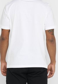 adidas Performance Camiseta estampada - white