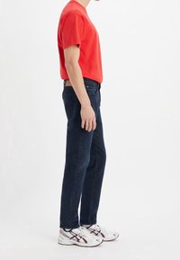 Levi's® Jeans Tapered Fit - dark-blue denim