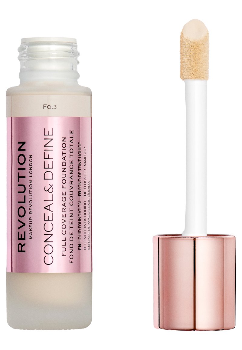 Fond de teint liquide à couverture complète dans un flacon en verre givré avec une étiquette rose. Applicateur blanc avec une pointe douce et un capuchon réfléchissant en rose doré.