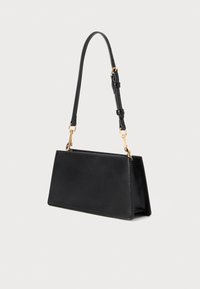 Black rectangular leather shoulder bag with adjustable strap and gold metal hardware on white background.