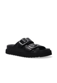 Schwarze Leder-Sandalen mit zwei verstellbaren Schnallen, dicker Sohle und einem strukturierten Fußbett für zusätzlichen Komfort. Einfaches, funktionales Design.