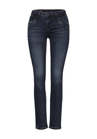 Mörkblå denimjeans med rak benform, med framfickor och dragkedja. Slät textur med minimal blekning.