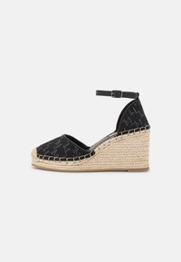 KAMINI MID EMBRO ANKLE LOOP - Saltos plataforma - black