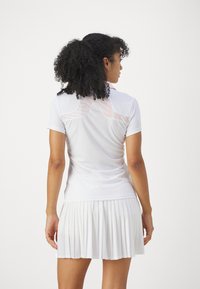 J.LINDEBERG Sports CASSIE  - Polo shirt - dazzle wave rose