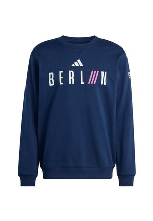 Tmavě modrá mikina s bílým a růžovým nápisem "BERL///N" a logem Adidas na hrudi, s žebrovanými manžetami a dolním lemem, dlouhými rukávy.