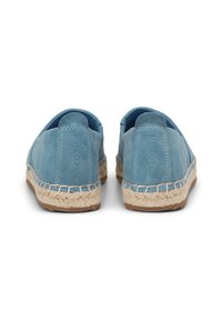Blue suede espadrilles with a jute sole, featuring a low-cut back and stitched detailing along the edge. Minimal branding on the heel.