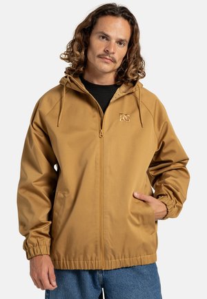 Brown hooded jacket made from smooth material, featuring a full zipper, elastic cuffs, and logo detail on the chest. Front pockets included.