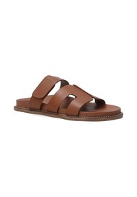 Braune Leder-Sandalen mit zwei breiten Riemen und Ausschnitten. Flacher Sohlen mit kontrastierenden Nähten entlang der Kante.