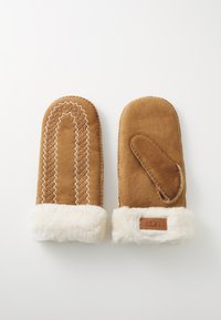Brune semskede votter med hvite pelsmansjetter, med dekorativ søm og åpning for tommel på siden. UGG-logo på en mansjett.