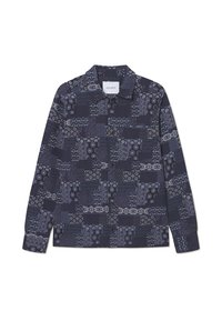 Navy patterned shirt with long sleeves, featuring various textures and designs in light blue and white. Button-down collar; labeled "LES DEUX."