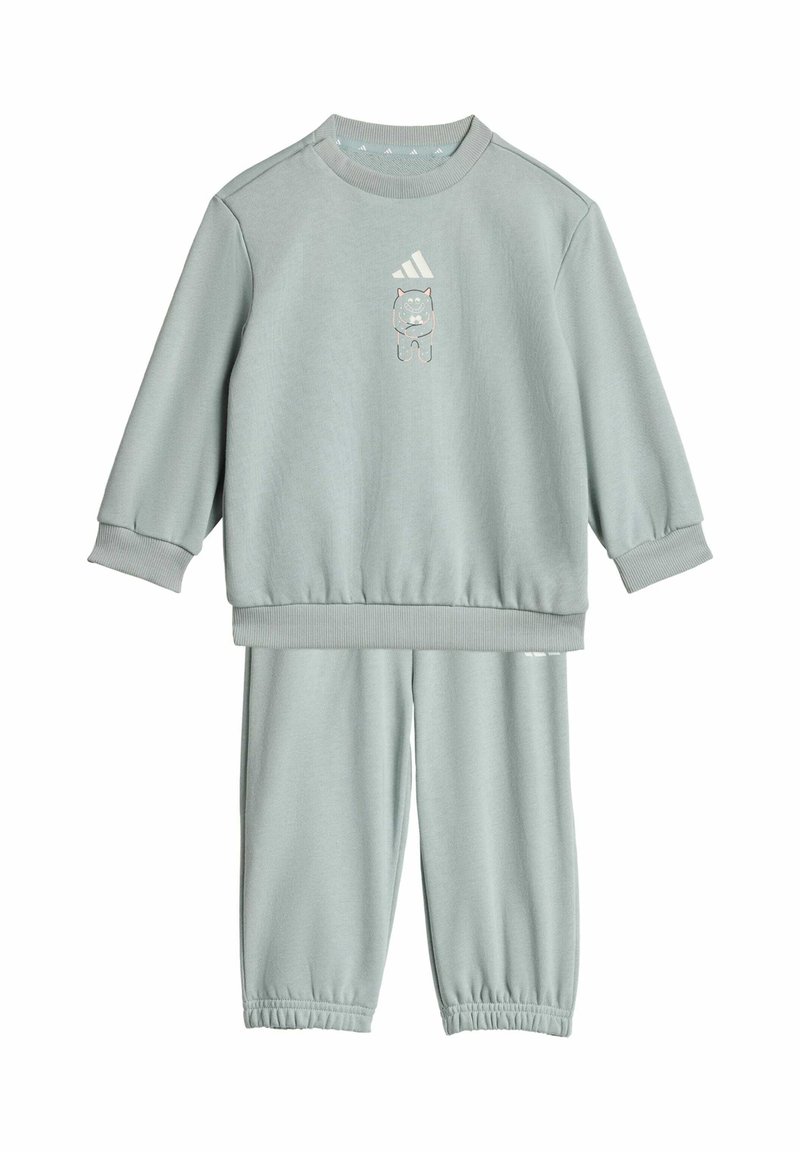 Svetlozelený bavlnený tréningový komplet, ktorý obsahuje mikinu s lemovanými manžetami a grafikou medvedíka, v kombinácii s nohavicami na elastický pás.