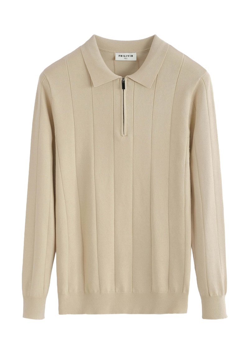 Pull beige en matière tricotée avec un col et une courte fermeture éclair. Présente une texture côtelée verticale et des poignets ajustés.