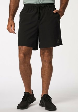 Sorte badeshorts med elastisk talje og snore, med sidelommer og et lille logo på venstre underben.