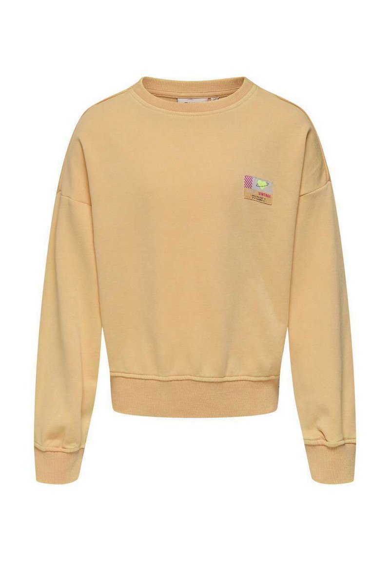 Sweatshirt jaune avec col et poignets côtelés, au design court, présentant un petit logo coloré en patch sur le côté avant gauche.