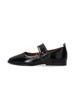 Black patent leather Mary Jane shoes featuring a pointed toe, adjustable strap with buckle, and a leopard print insole.