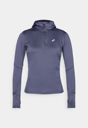Langemouwen sporttop in donkerblauw, met een ritskraag, capuchon en duimopeningen. Gelaagd materiaal met een geometrisch patroon. Logo op de borst.