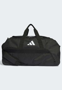Black duffle bag made from durable fabric with a smooth texture. Features dual handles, a shoulder strap, and a white logo on the side.