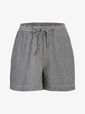 Must-valge ruuduline lühike püksid elastse vöökohaga ja ees keskel asuva paelaga, mis on lipsuks seotud.