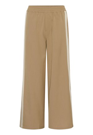 Beežid laiade säärtega püksid elastse vöörihma, esiosa õmbluse detaili ja valgete küljeribadega mõlemal säärel.