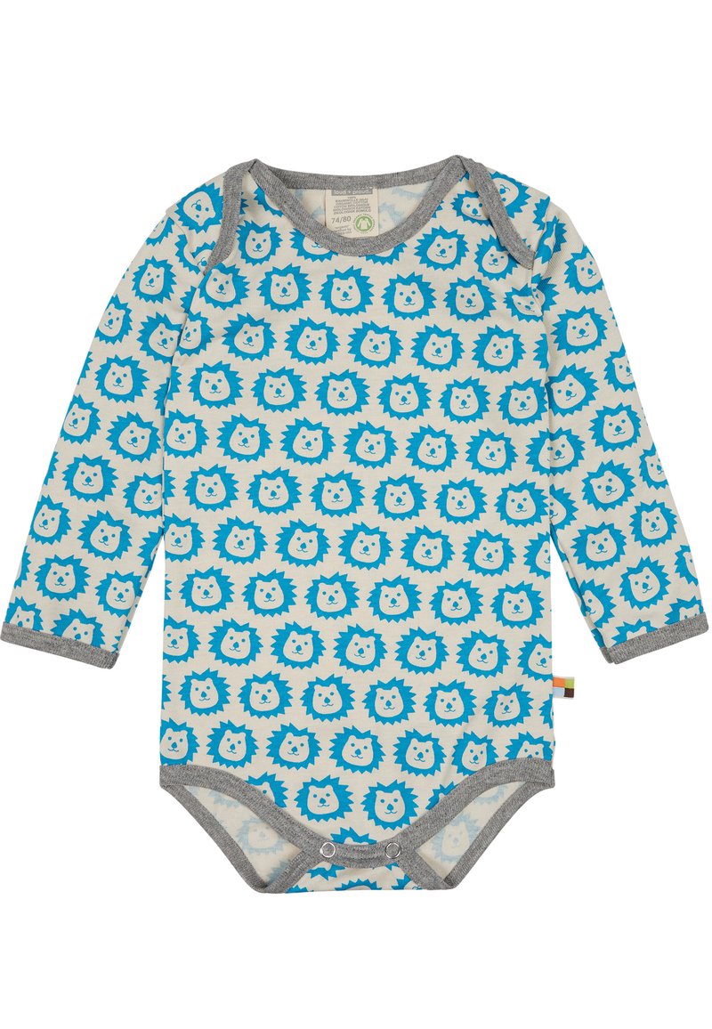 Pagliaccetto a maniche lunghe di un beige chiaro con un motivo di faccia di leone blu. Bordo grigio attorno al collo e alle aperture delle gambe, dotato di chiusure a scatto nella parte inferiore.