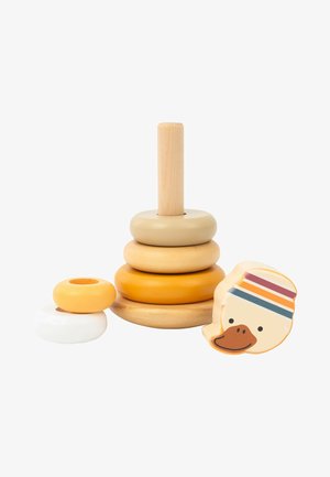 Wooden stacking toy with five rings in beige, yellow, and white, on a circular base, accompanied by a duck character with a striped hat.