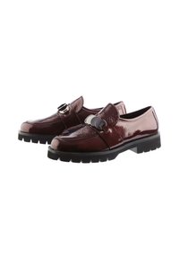 Burgundy leather loafers with glossy finish, decorative strap, and round silver hardware. Textured side panels, black rubber sole with treads.