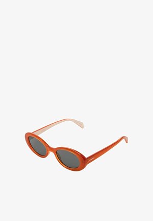 Lunettes de soleil ovales orange avec des verres foncés. Monture en plastique élégant, branches fines et logo discret sur le côté.
