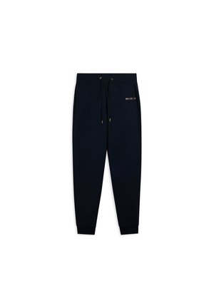 Pantaloni sportivi blu navy realizzati in morbido tessuto, con vita elastica e cordoncino, e polsini a coste. Dettaglio del logo dorato sul lato.