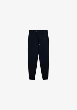 Pantaloni sportivi blu navy realizzati in morbido tessuto, con vita elastica e cordoncino, e polsini a coste. Dettaglio del logo dorato sul lato.