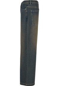 Denim traperice tamnosive boje, s ravnim nogavicama, pet džepova i vidljivim šavovima. Teksturedna tkanina s blagim sjajem.