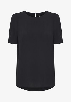 Blouse noire à manches courtes en tissu lisse. Encolure ronde avec une fermeture bouton dans le dos en forme de clé. Coupe droite avec un ourlet légèrement arrondi.